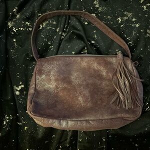 Hobo brand hobo style shoulder bag in plum. New without tags